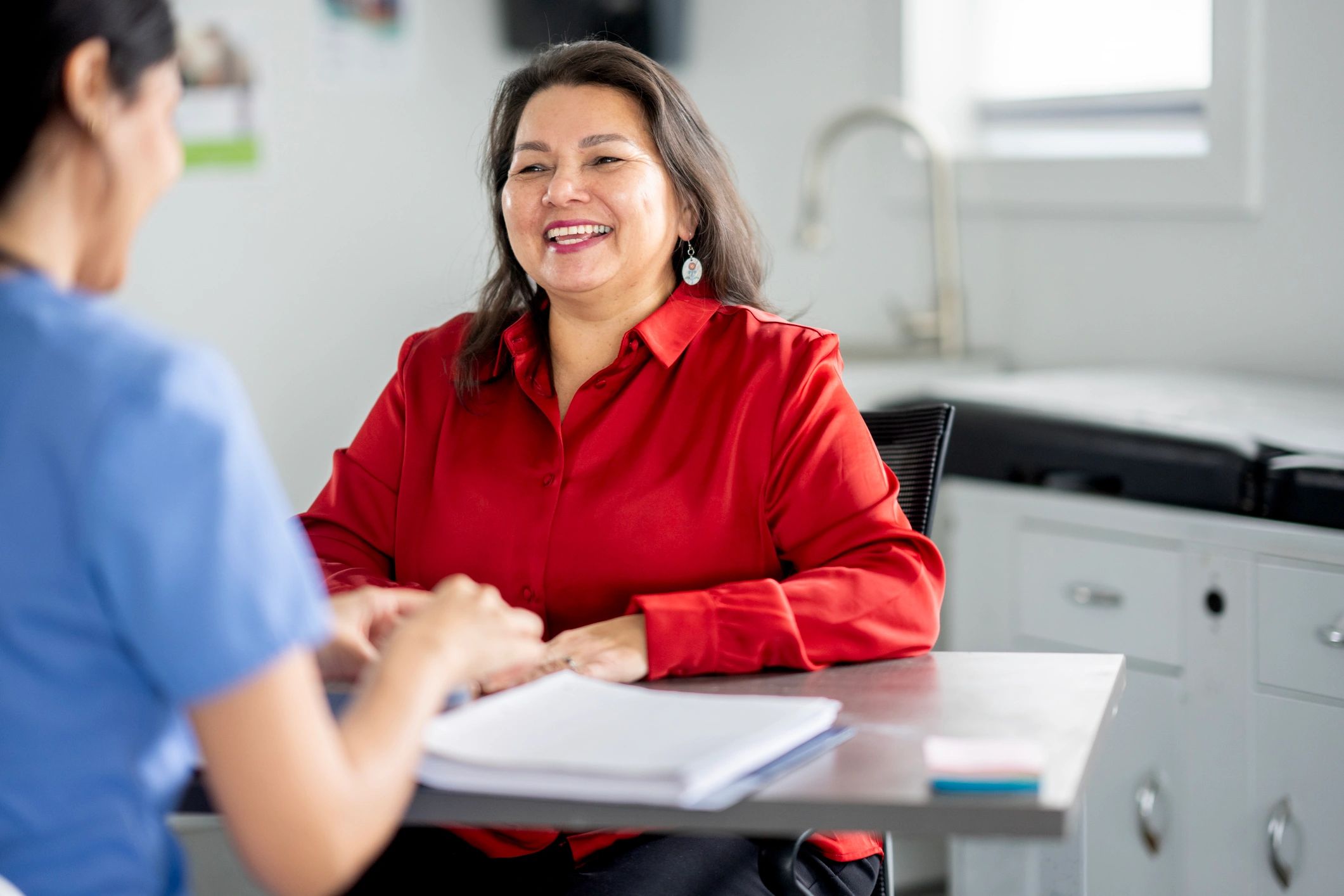 Women in a medical office consultation